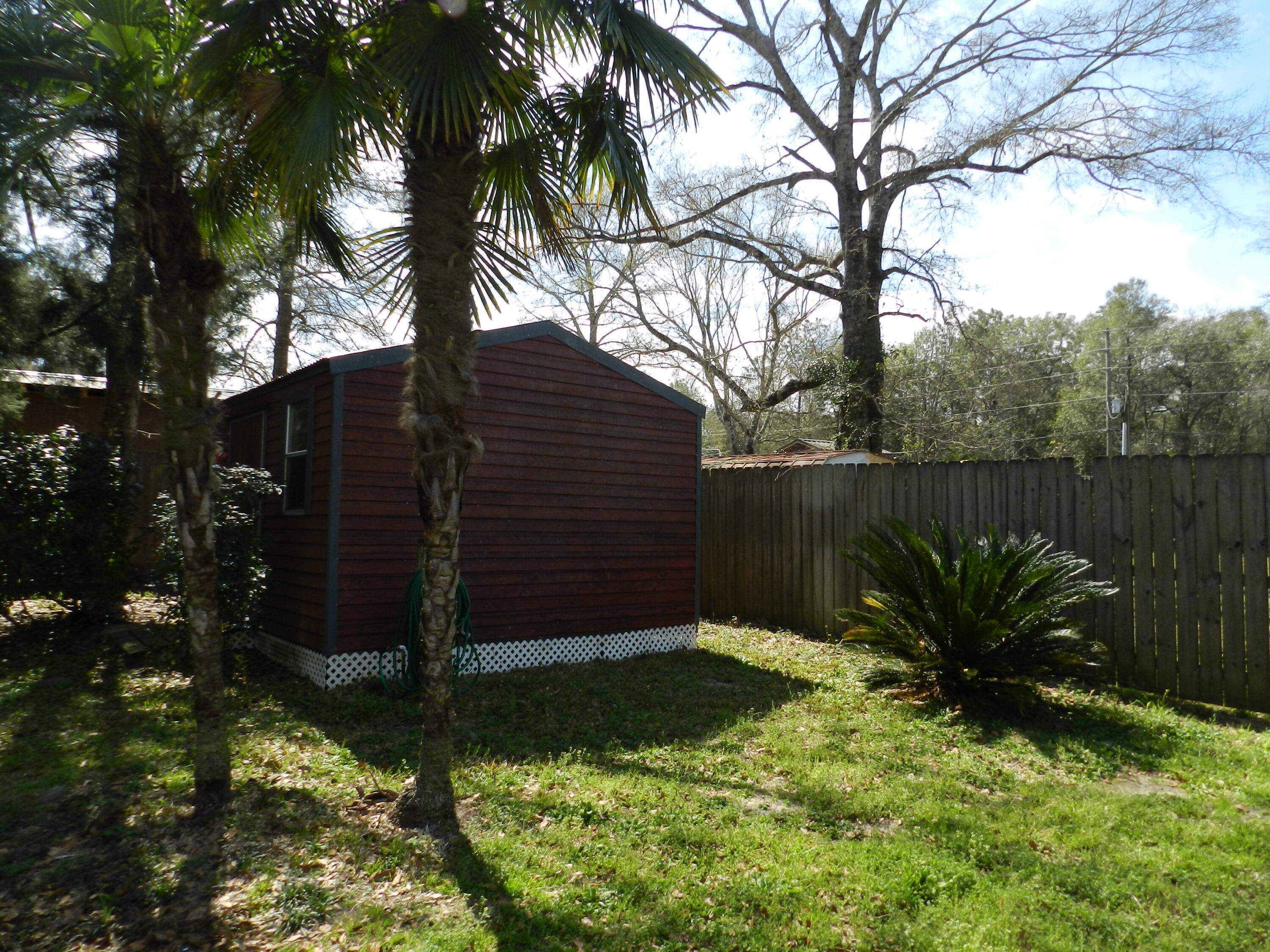 2710 Phil Tyner Road Crestview, FL 32536 - Photo 34 of 46 pool shed/ work shop