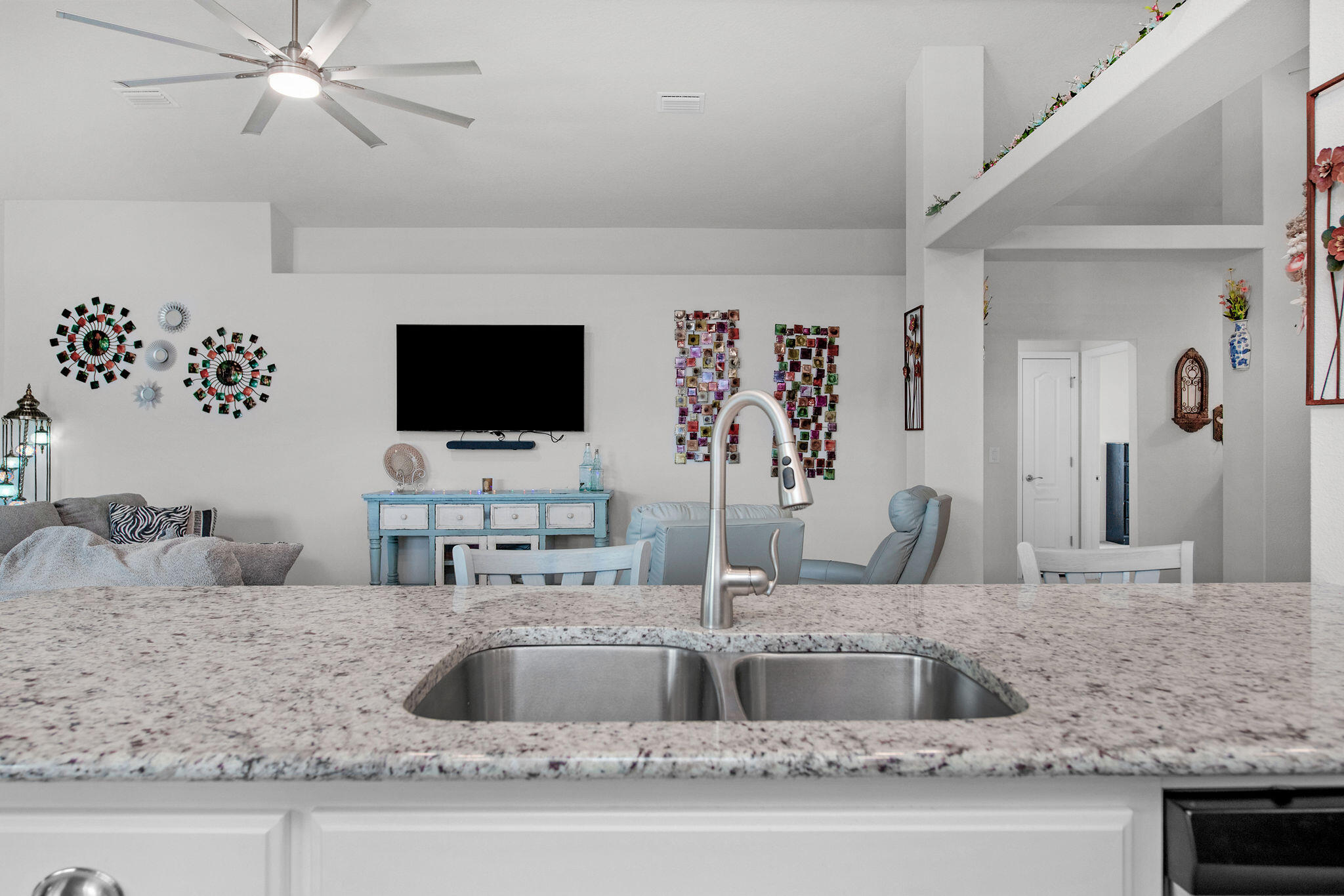 2099 Queen Street Crestview, FL 32536 - Photo 15 of 36 a kitchen with a sink and a mirror