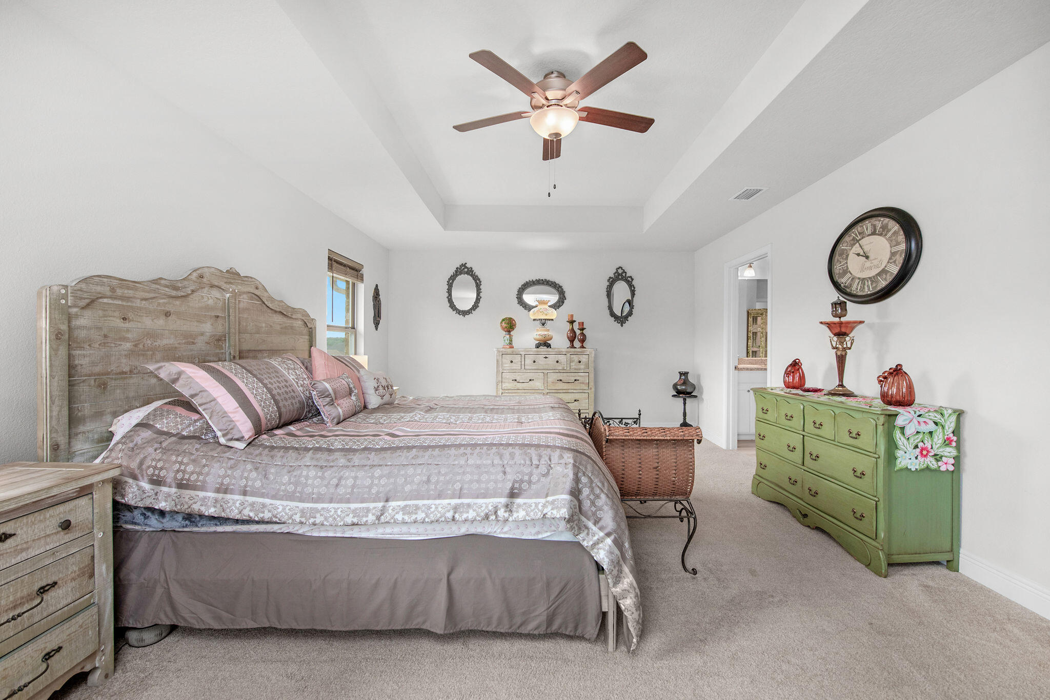 2099 Queen Street Crestview, FL 32536 - Photo 18 of 36 a bedroom with a bed and a chair