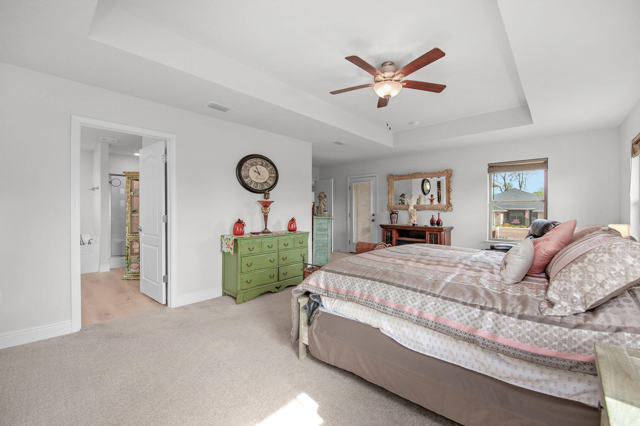 2099 Queen Street Crestview, FL 32536 - Photo 19 of 36 a bed room with a bed and a ceiling fan