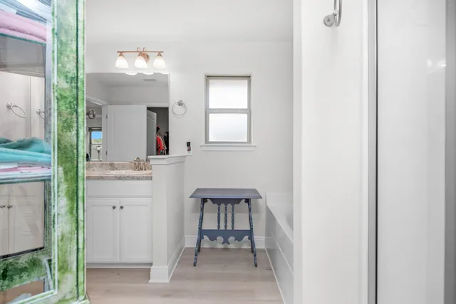 view of hall way with mirror