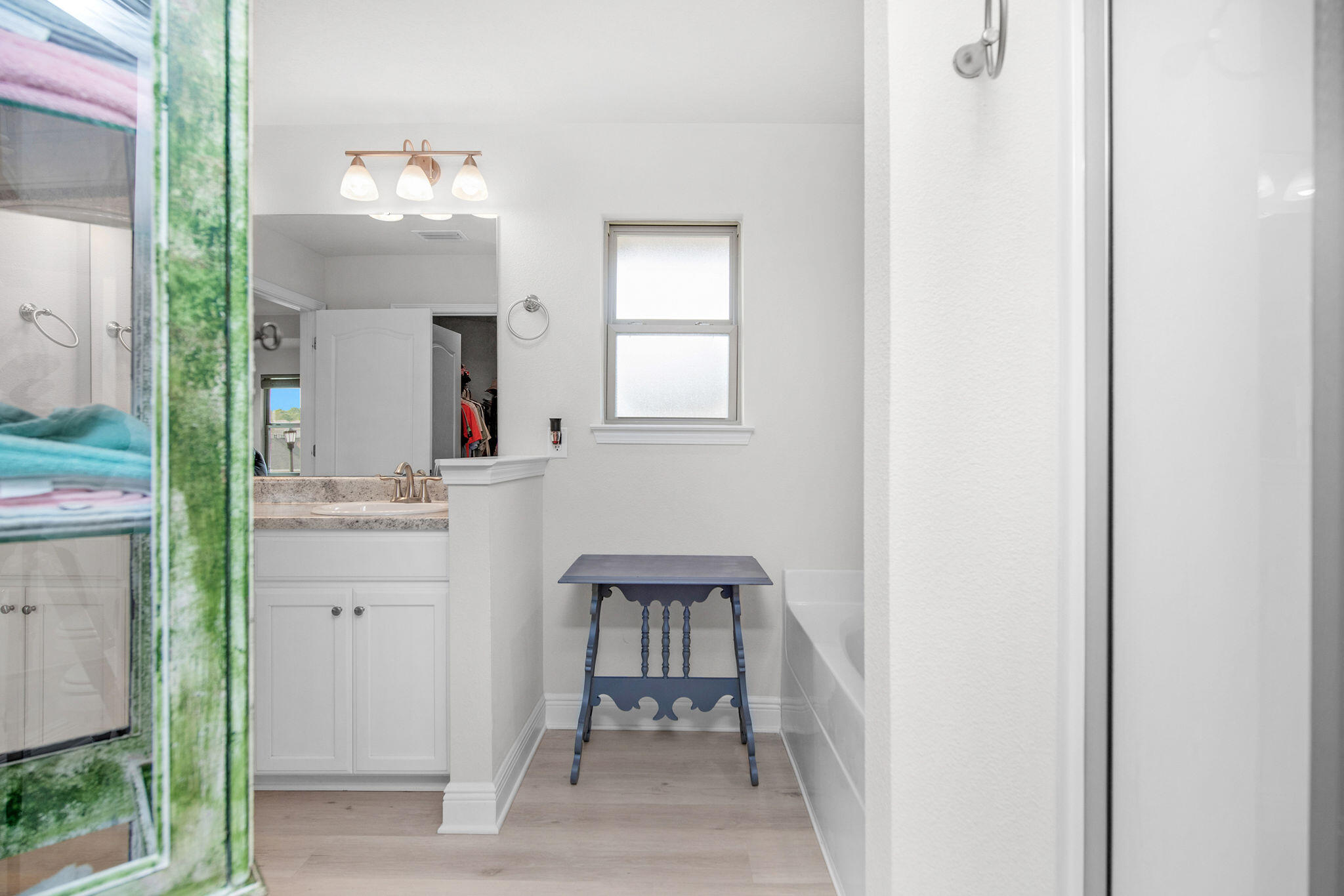 2099 Queen Street Crestview, FL 32536 - Photo 23 of 36 view of hall way with mirror