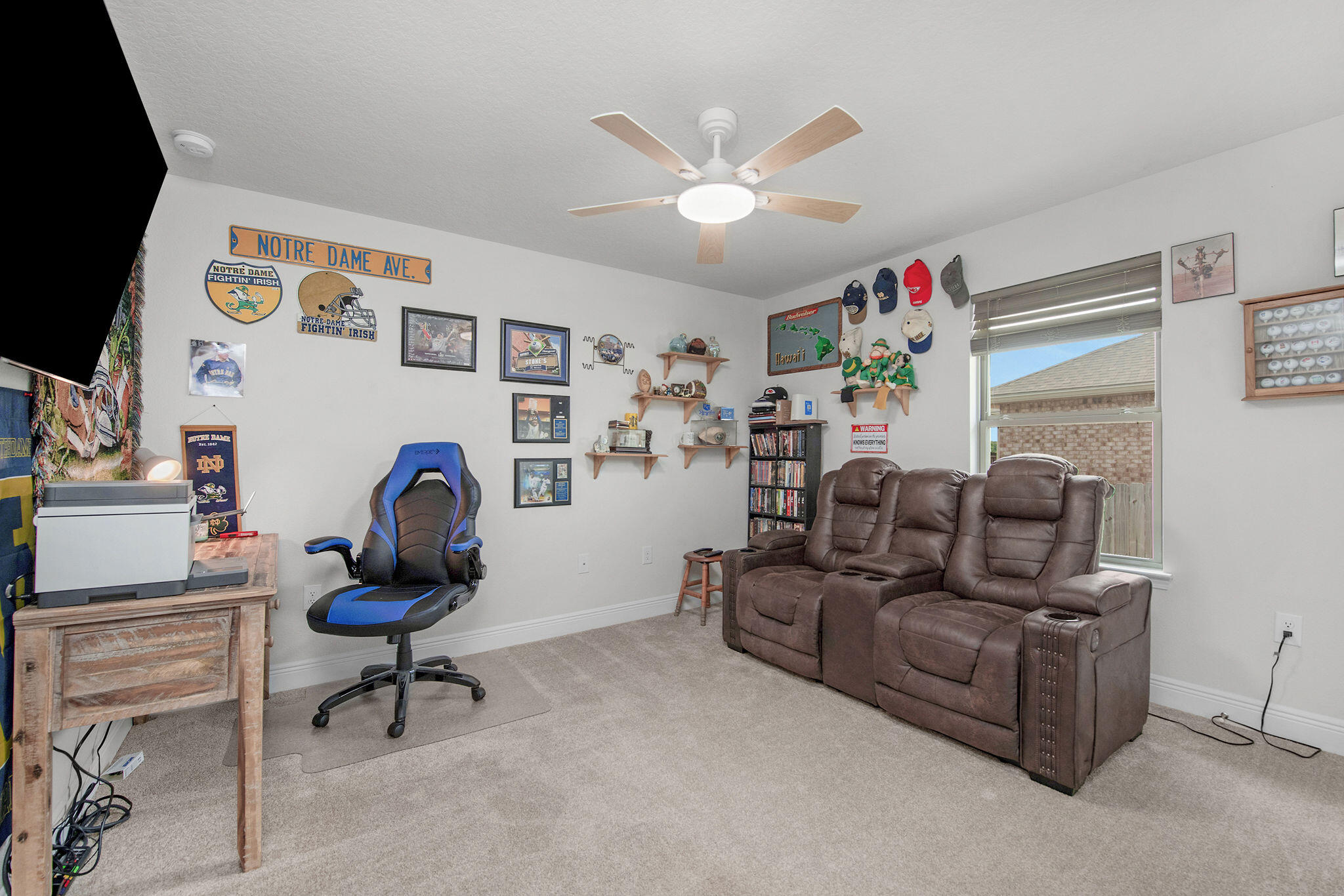 2099 Queen Street Crestview, FL 32536 - Photo 29 of 36 a living room with furniture and a flat screen tv