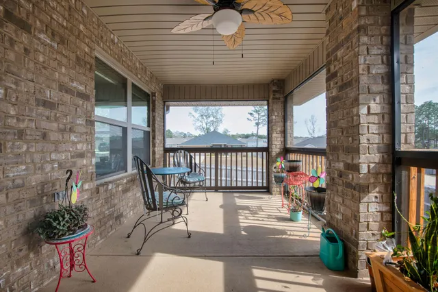 a view of a porch with furniture