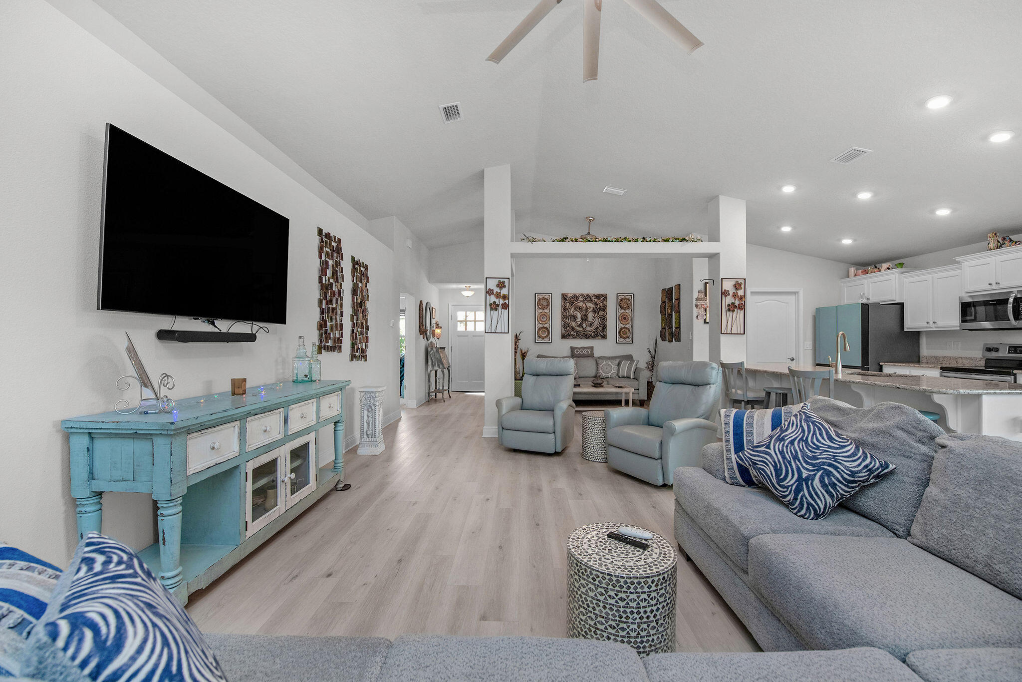 2099 Queen Street Crestview, FL 32536 - Photo 5 of 36 a living room with furniture and a flat screen tv