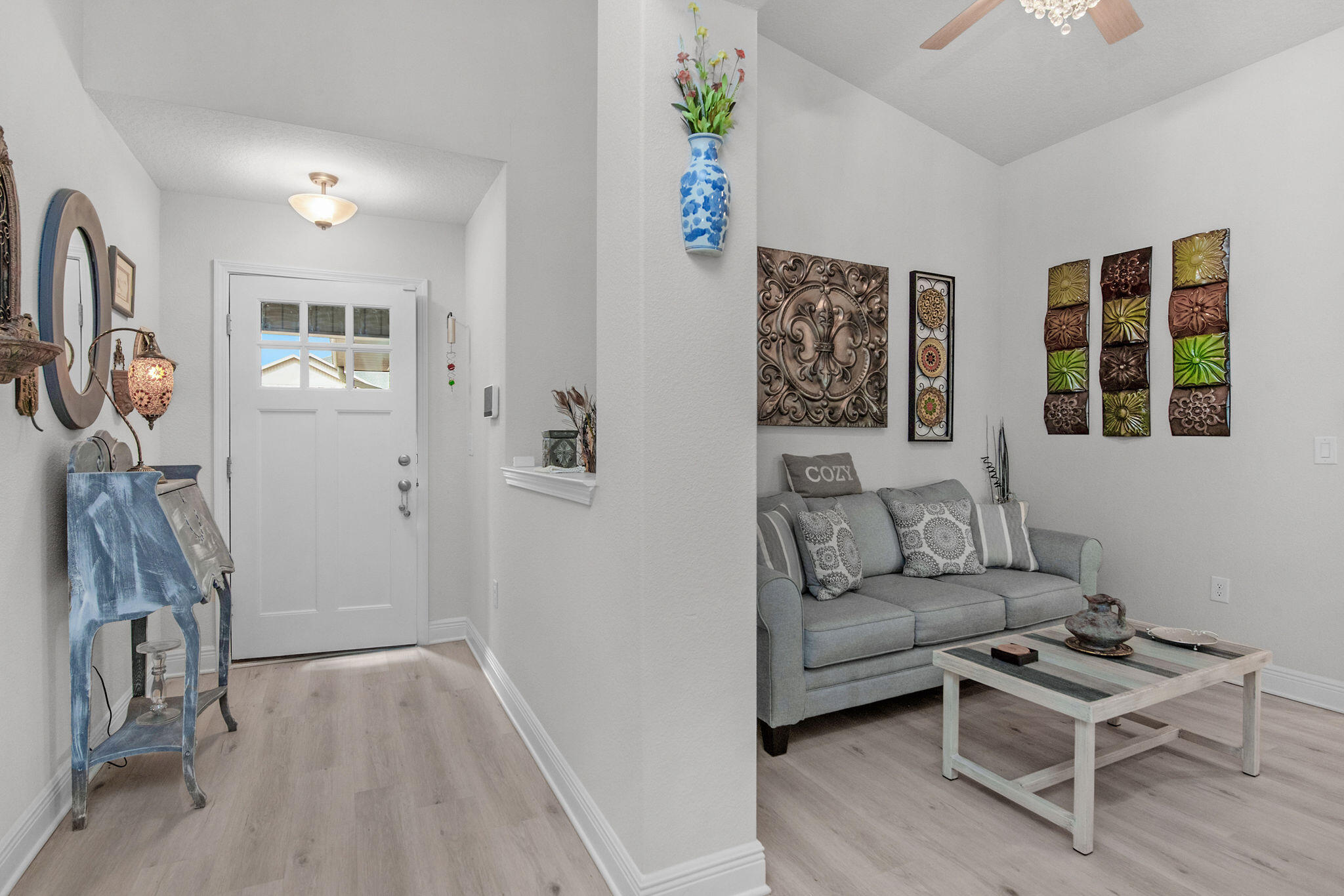 2099 Queen Street Crestview, FL 32536 - Photo 8 of 36 a living room with furniture a flat screen tv and a window
