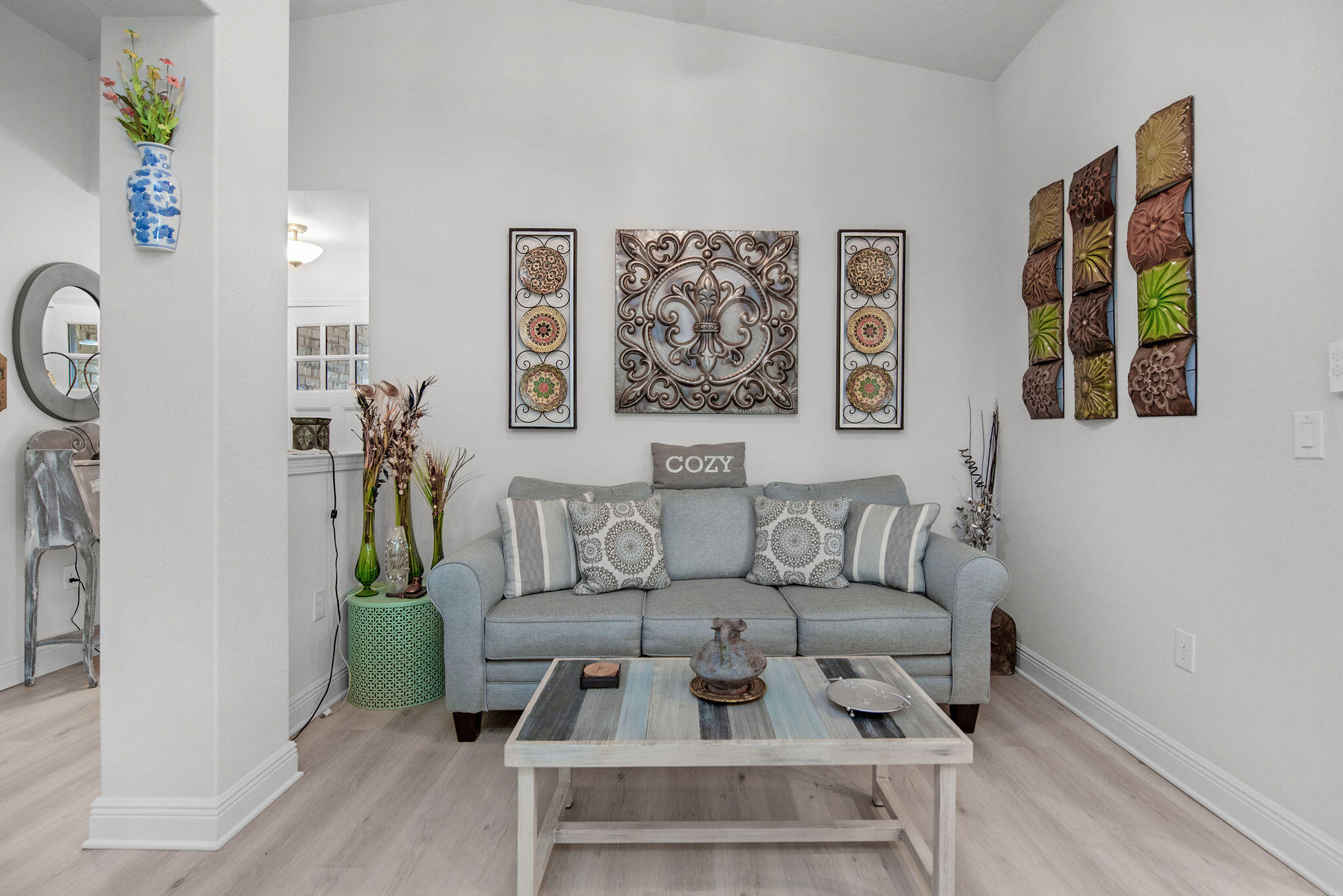 2099 Queen Street Crestview, FL 32536 - Photo 9 of 36 a living room with furniture and wooden floor