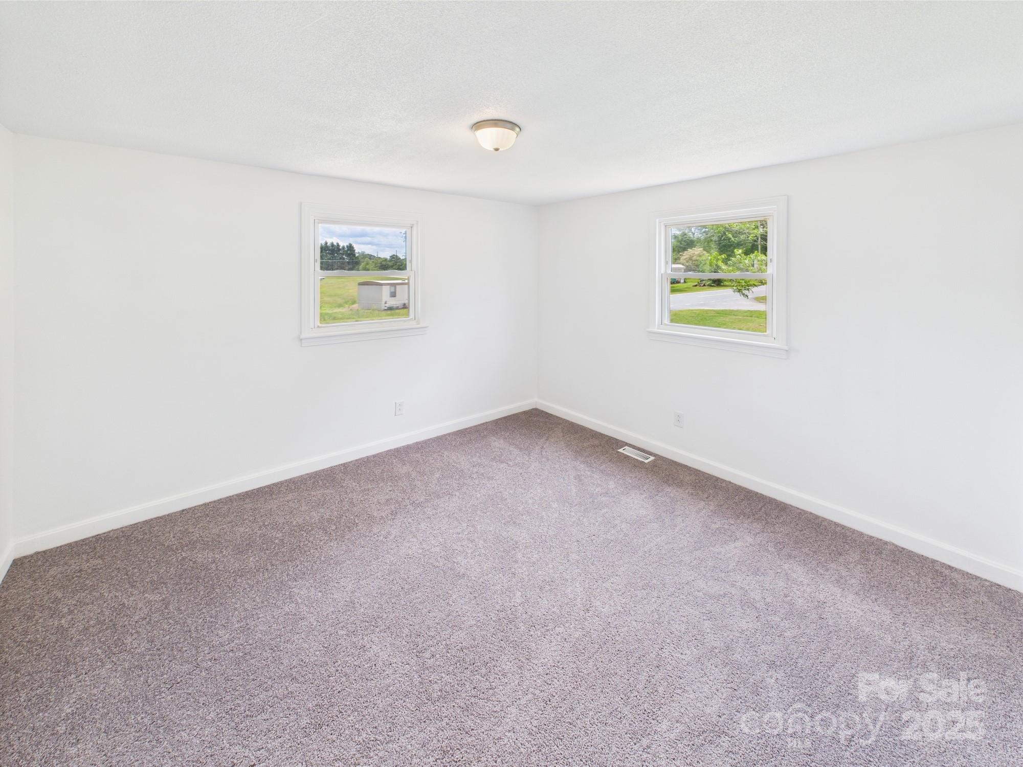 120 Hepler Road Taylorsville, NC 28681 - Photo 15 of 20 an empty room with a painting on the wall