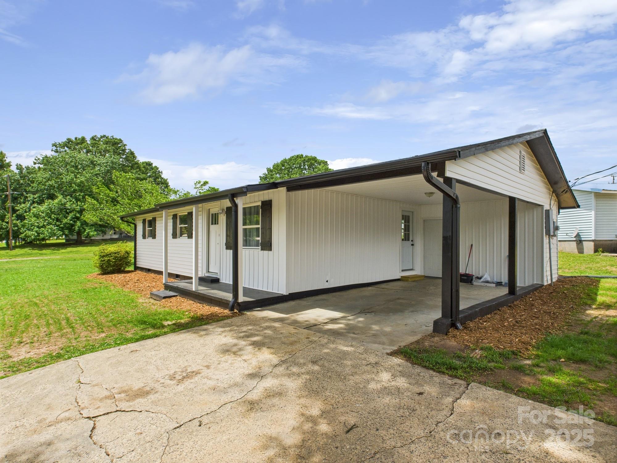 120 Hepler Road Taylorsville, NC 28681 - Photo 3 of 20 a view of a house with backyard and garden