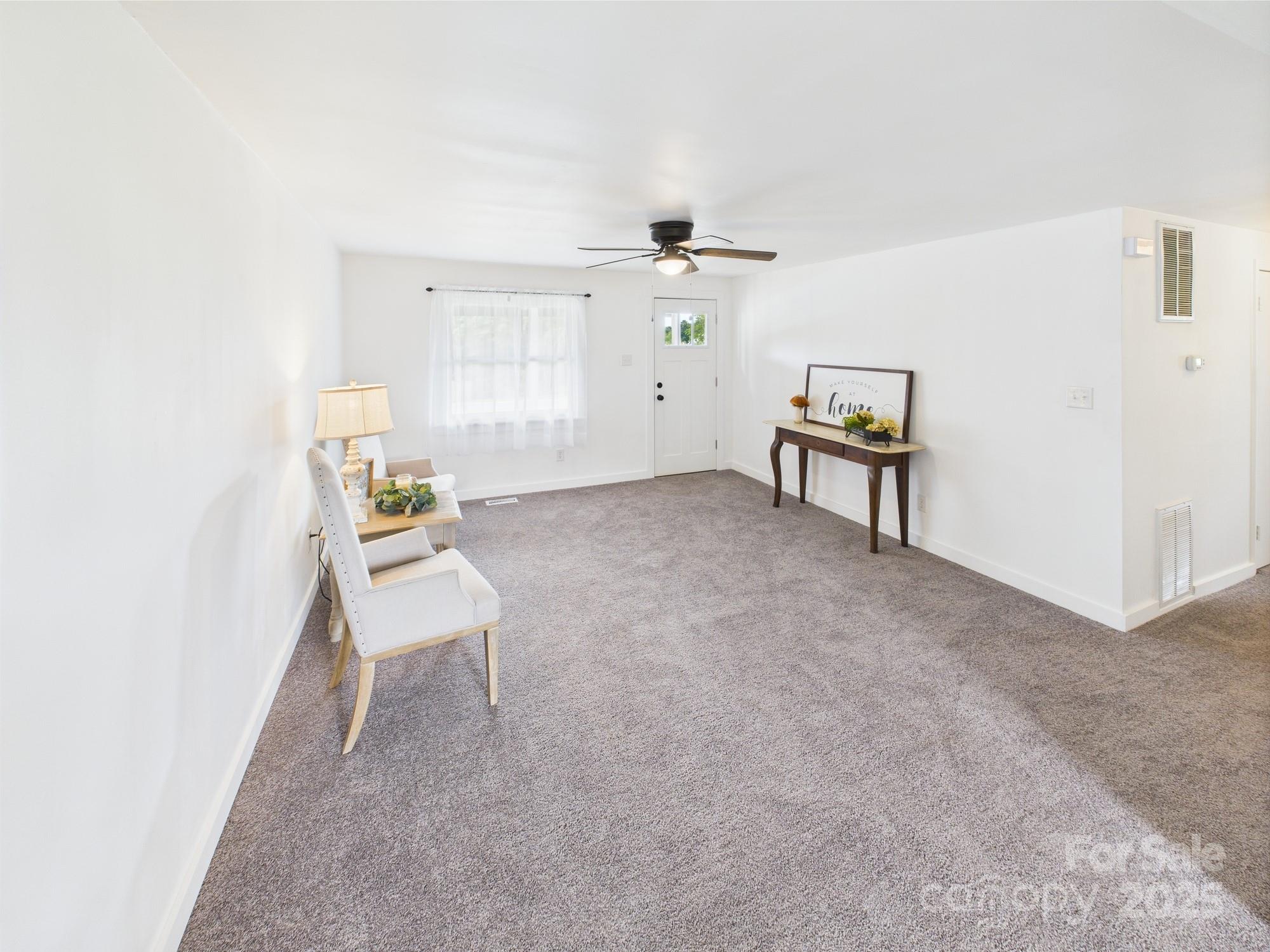 120 Hepler Road Taylorsville, NC 28681 - Photo 10 of 20 a living room with furniture and a table