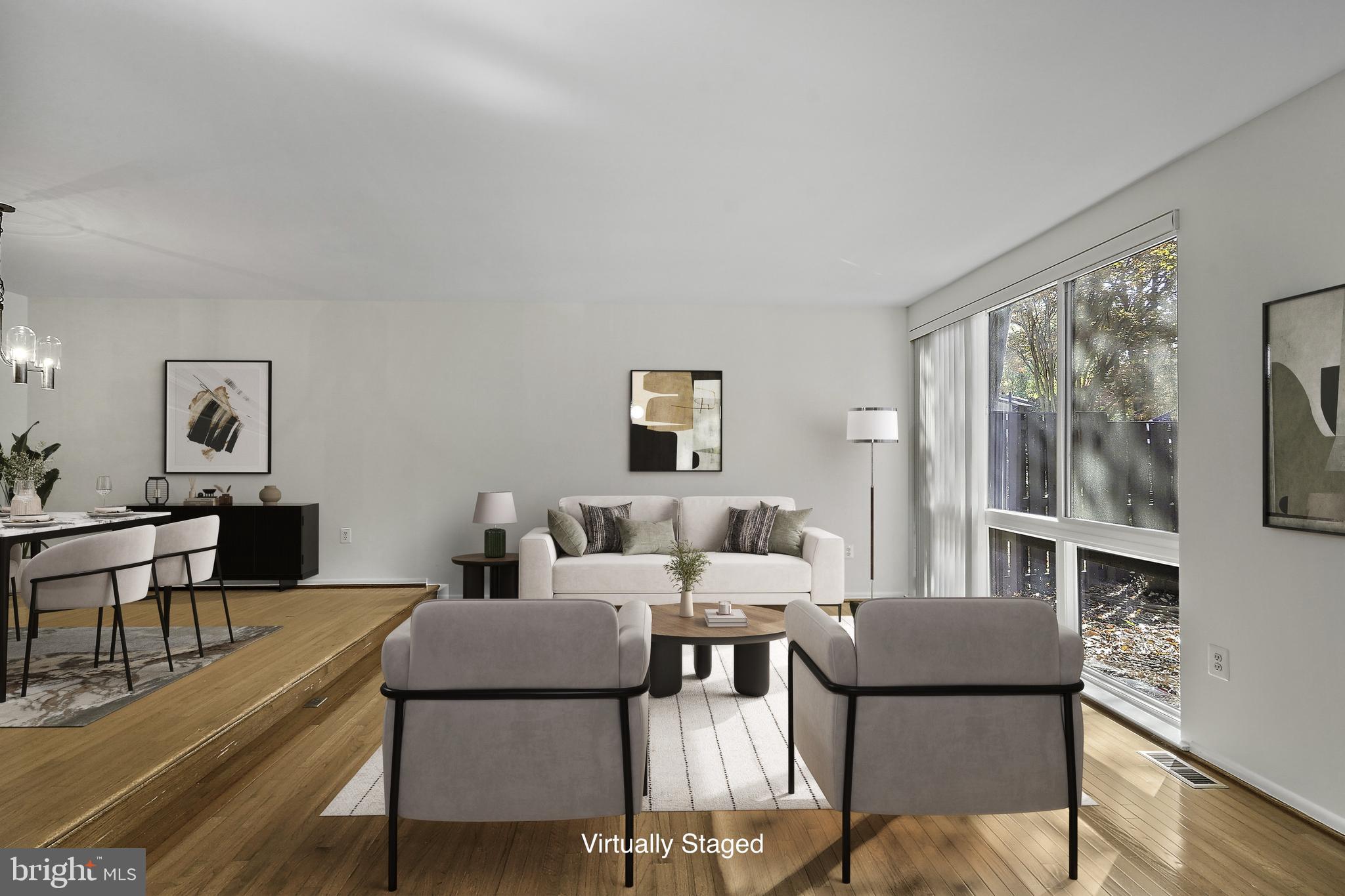 2006 Lakebreeze Way Reston, VA 20191 - Photo 12 of 49 a living room with furniture and a flat screen tv