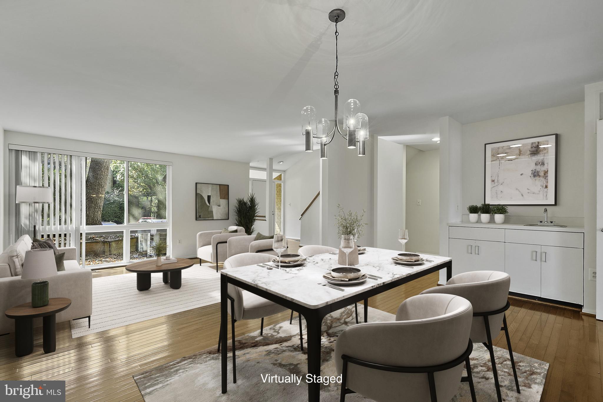 2006 Lakebreeze Way Reston, VA 20191 - Photo 15 of 49 a view of a dining room with furniture window and outside view