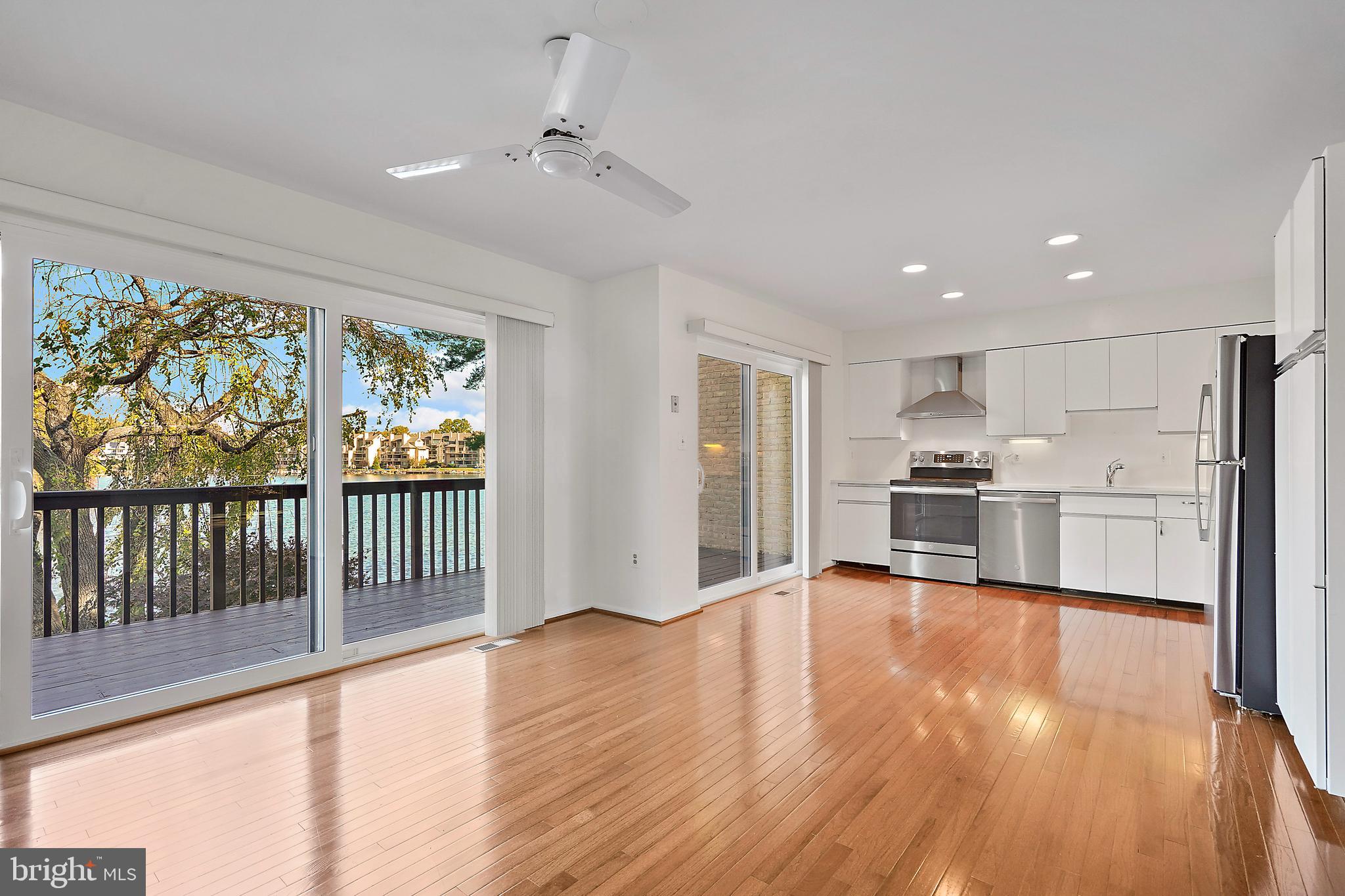 2006 Lakebreeze Way Reston, VA 20191 - Photo 20 of 49 a view of kitchen with wooden floor and electronic appliances