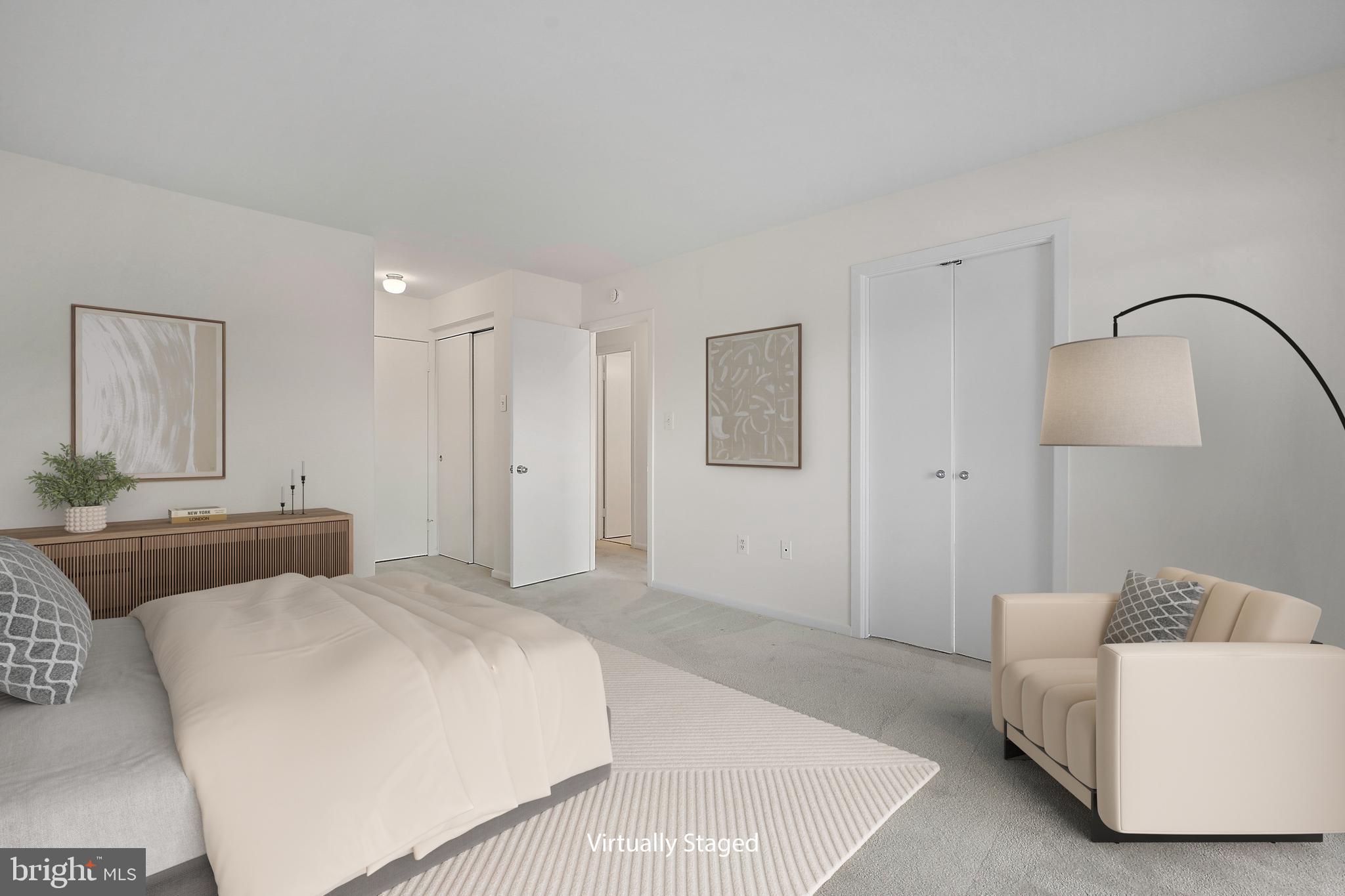 2006 Lakebreeze Way Reston, VA 20191 - Photo 26 of 49 a bedroom with a bed and a couch