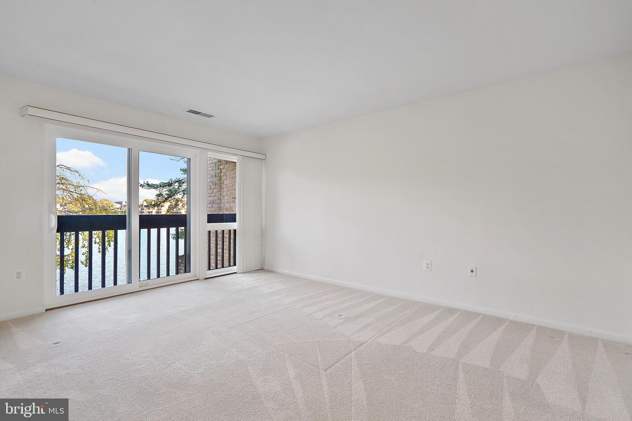 2006 Lakebreeze Way Reston, VA 20191 - Photo 30 of 49 a view of an empty room with windows