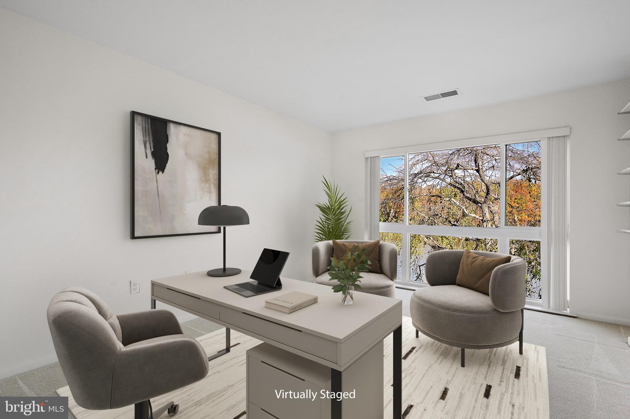 2006 Lakebreeze Way Reston, VA 20191 - Photo 32 of 49 a living room with furniture and a large window