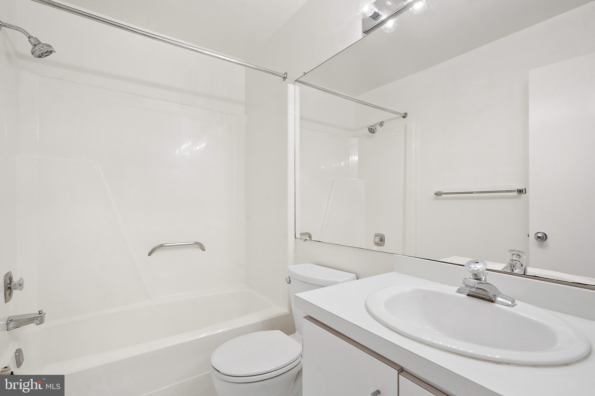 2006 Lakebreeze Way Reston, VA 20191 - Photo 35 of 49 a bathroom with a sink toilet and shower