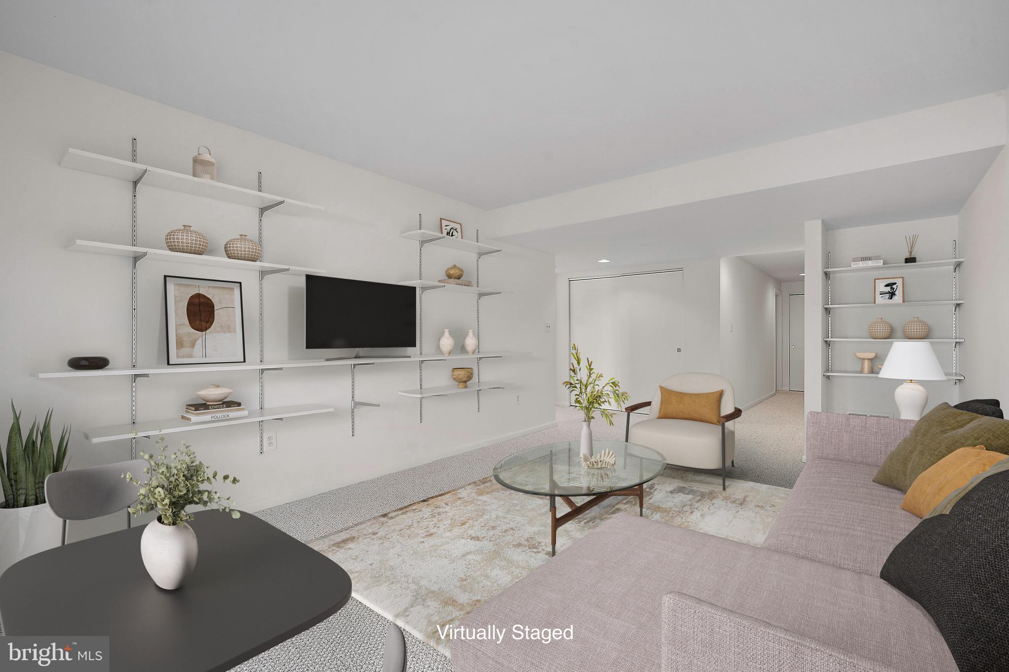 2006 Lakebreeze Way Reston, VA 20191 - Photo 39 of 49 a living room with furniture and a flat screen tv