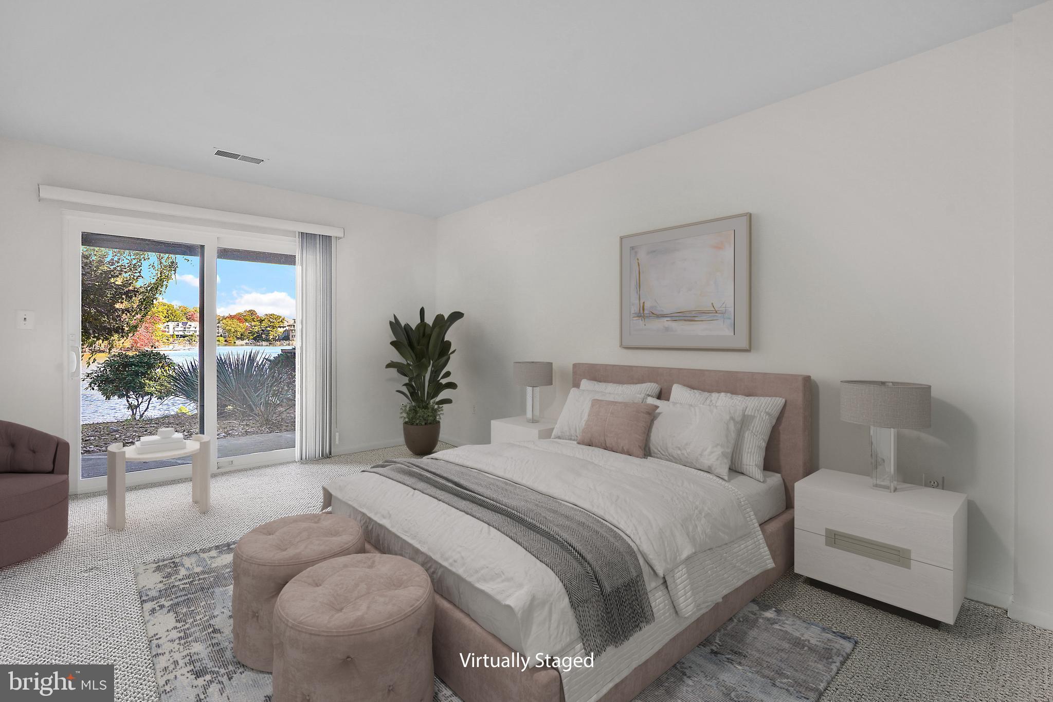 2006 Lakebreeze Way Reston, VA 20191 - Photo 41 of 49 a bedroom with a large bed and a couch