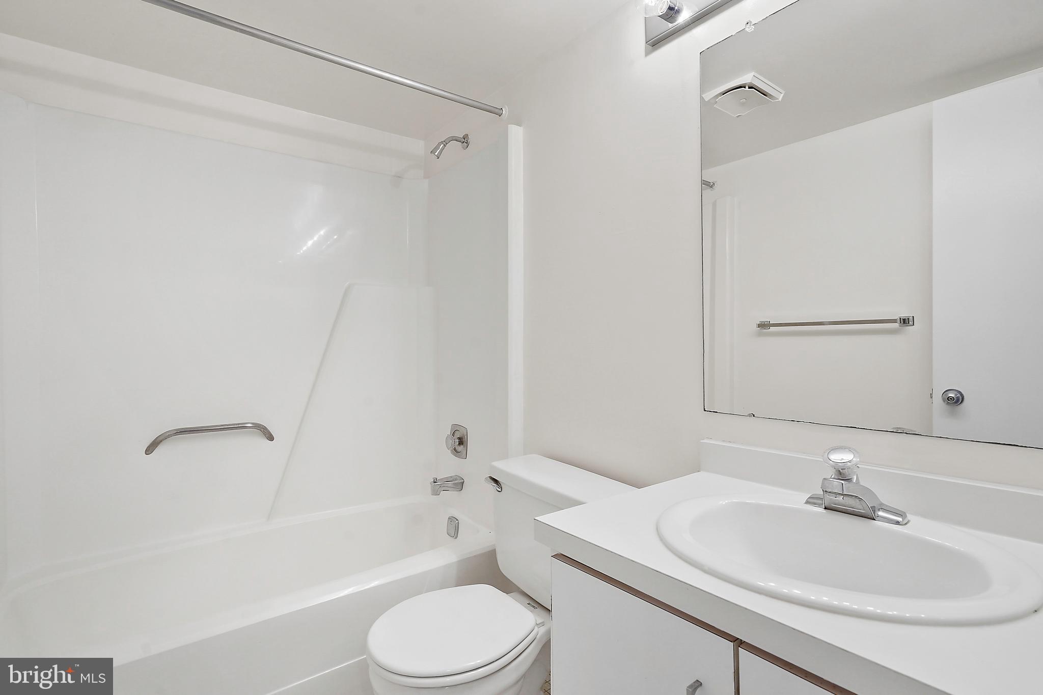 2006 Lakebreeze Way Reston, VA 20191 - Photo 43 of 49 a bathroom with a sink toilet and shower