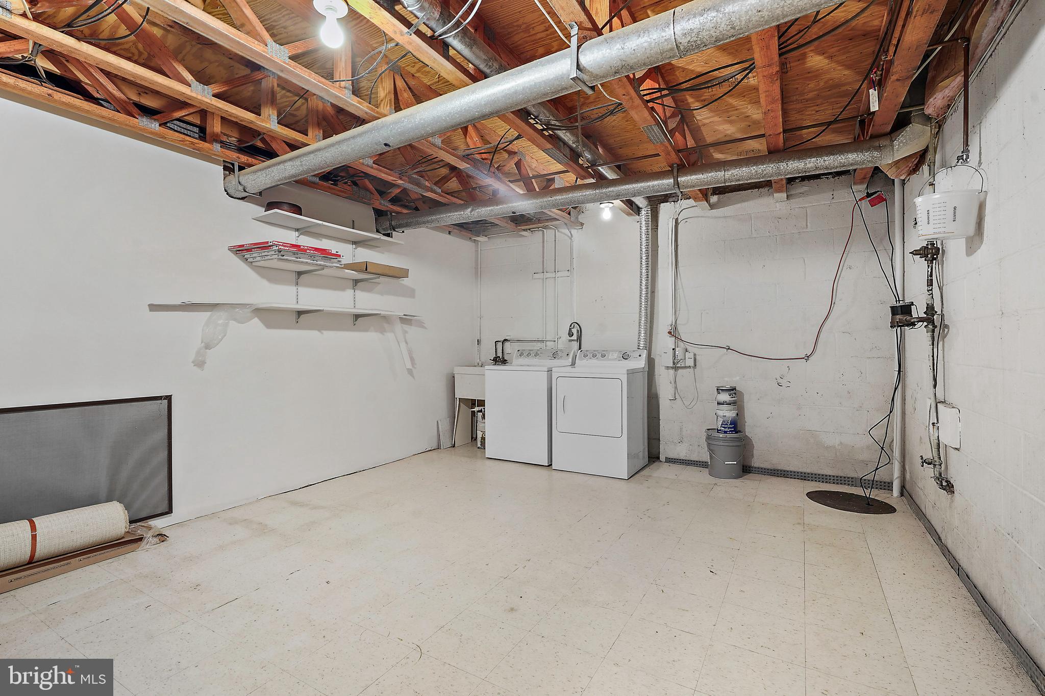 2006 Lakebreeze Way Reston, VA 20191 - Photo 44 of 49 a view of a room with racks on the wall