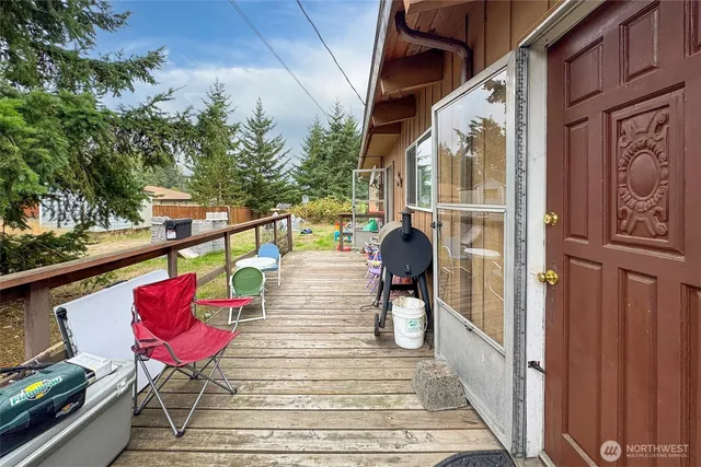 a view of balcony with furniture