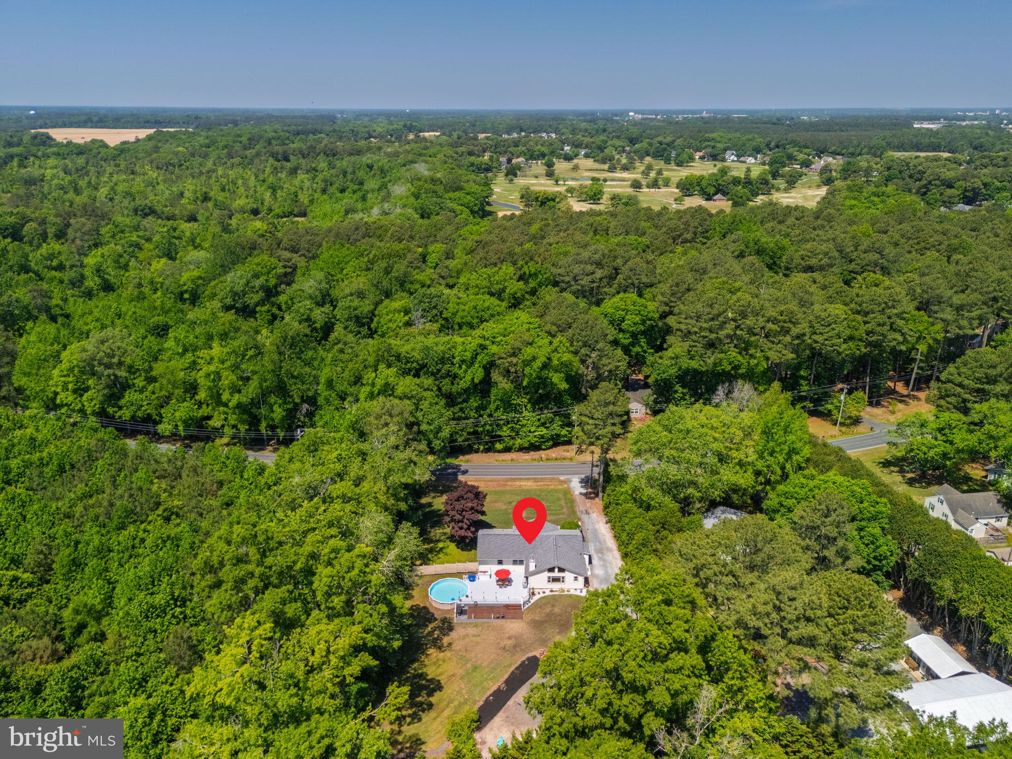 4563 Nutters Cross Road Salisbury, MD 21804 - Photo 23 of 52 an aerial view of residential houses with outdoor space and trees