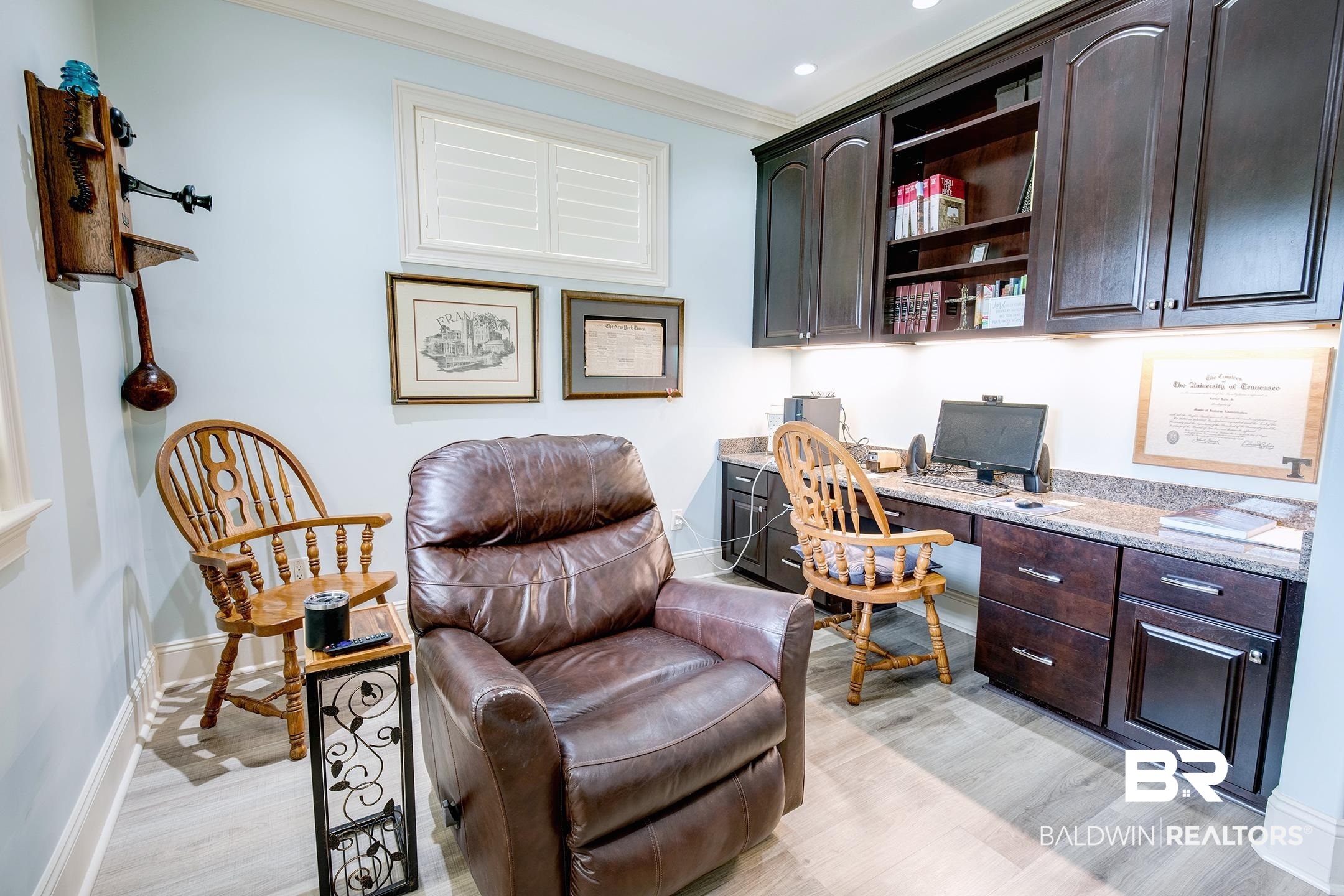 9357 Lakeview Drive Foley, AL 36535 - Photo 50 of 68 Custom built-in desk with dark wood cabinetry and integrated shelving