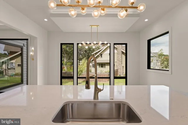 a view of an empty room with glass door