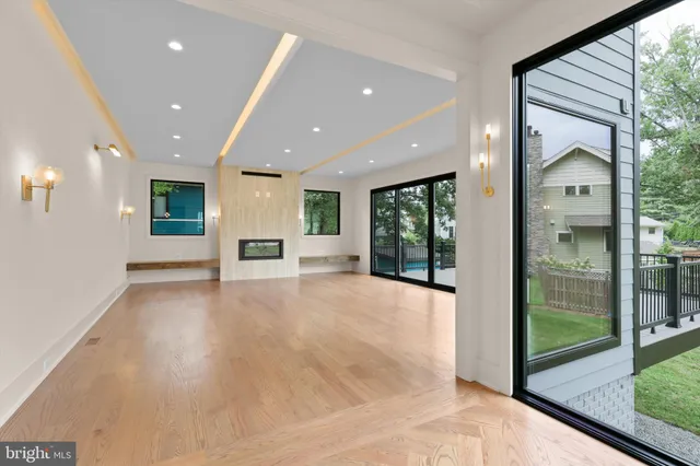 a view of an entryway with wooden floor