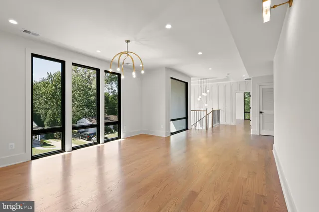a bathroom with a sink a vanity and a toilet