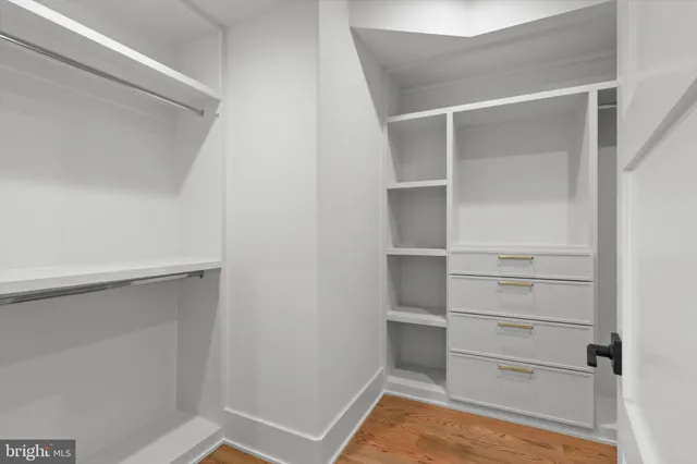 a bathroom with a toilet a sink and bathtub