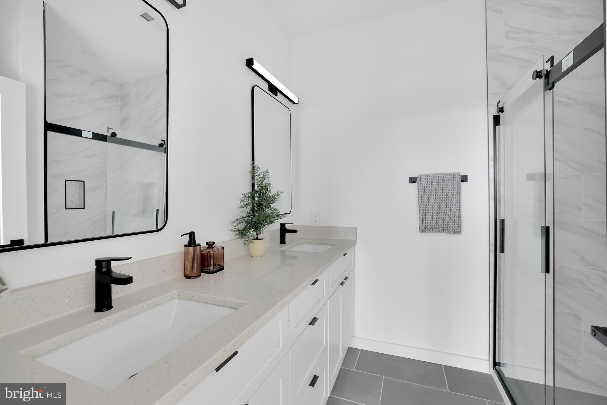 1036 Howard Road Southeast Washington, DC 20020 - Photo 13 of 35 Primary Bathroom w/ Double Vanities