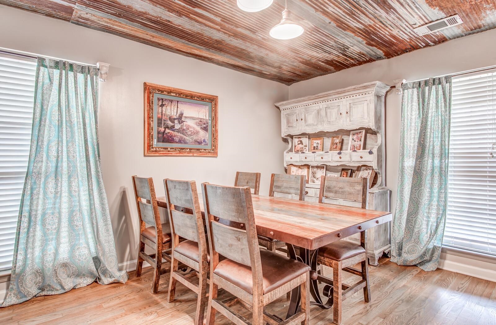 9970 Idaville Road Atoka, TN 38004 - Photo 6 of 25 a dining room with furniture and wooden floor