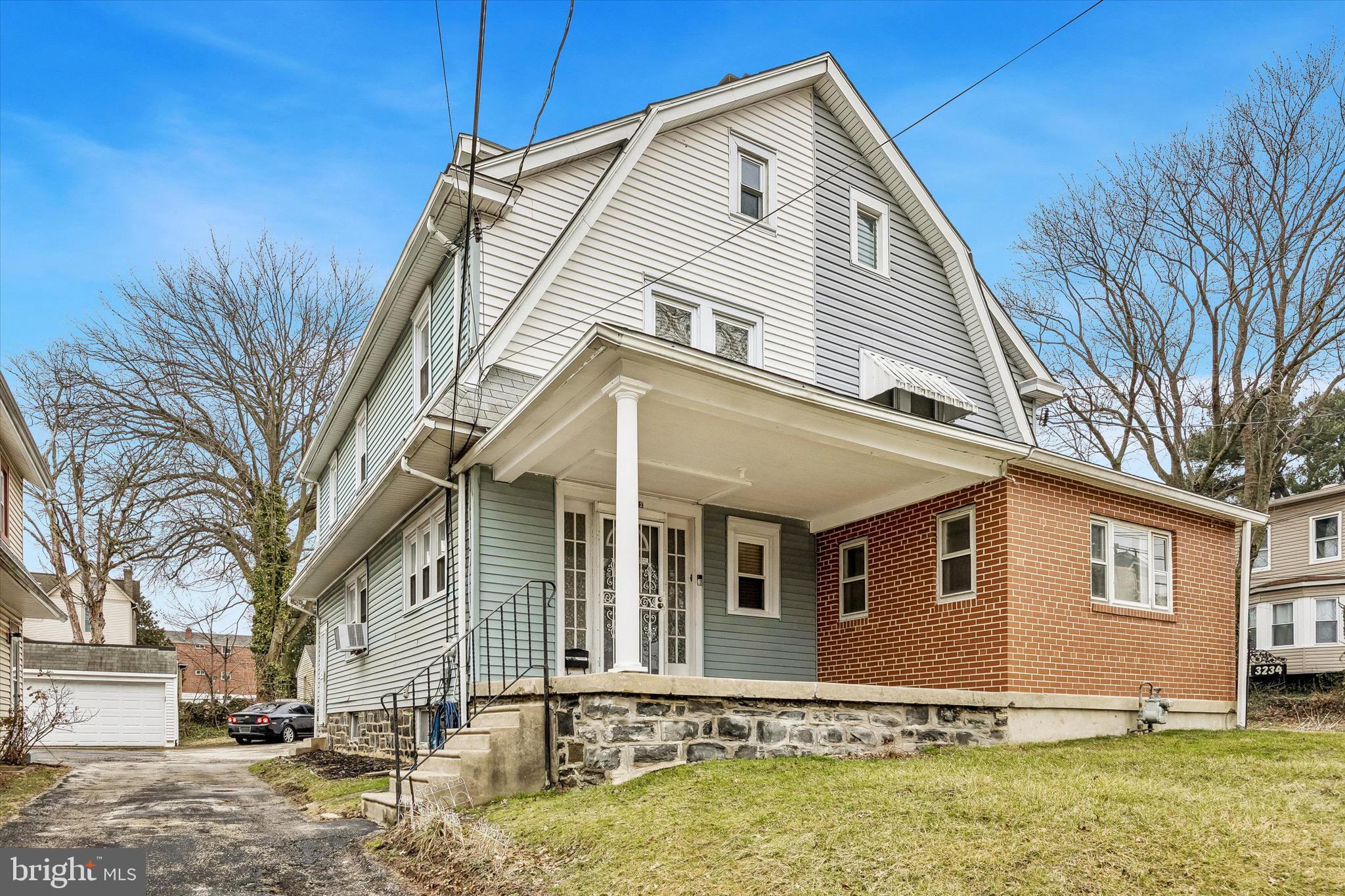 3232 Marshall Road Drexel Hill, PA 19026 - Photo 1 of 1 a front view of a house with yard
