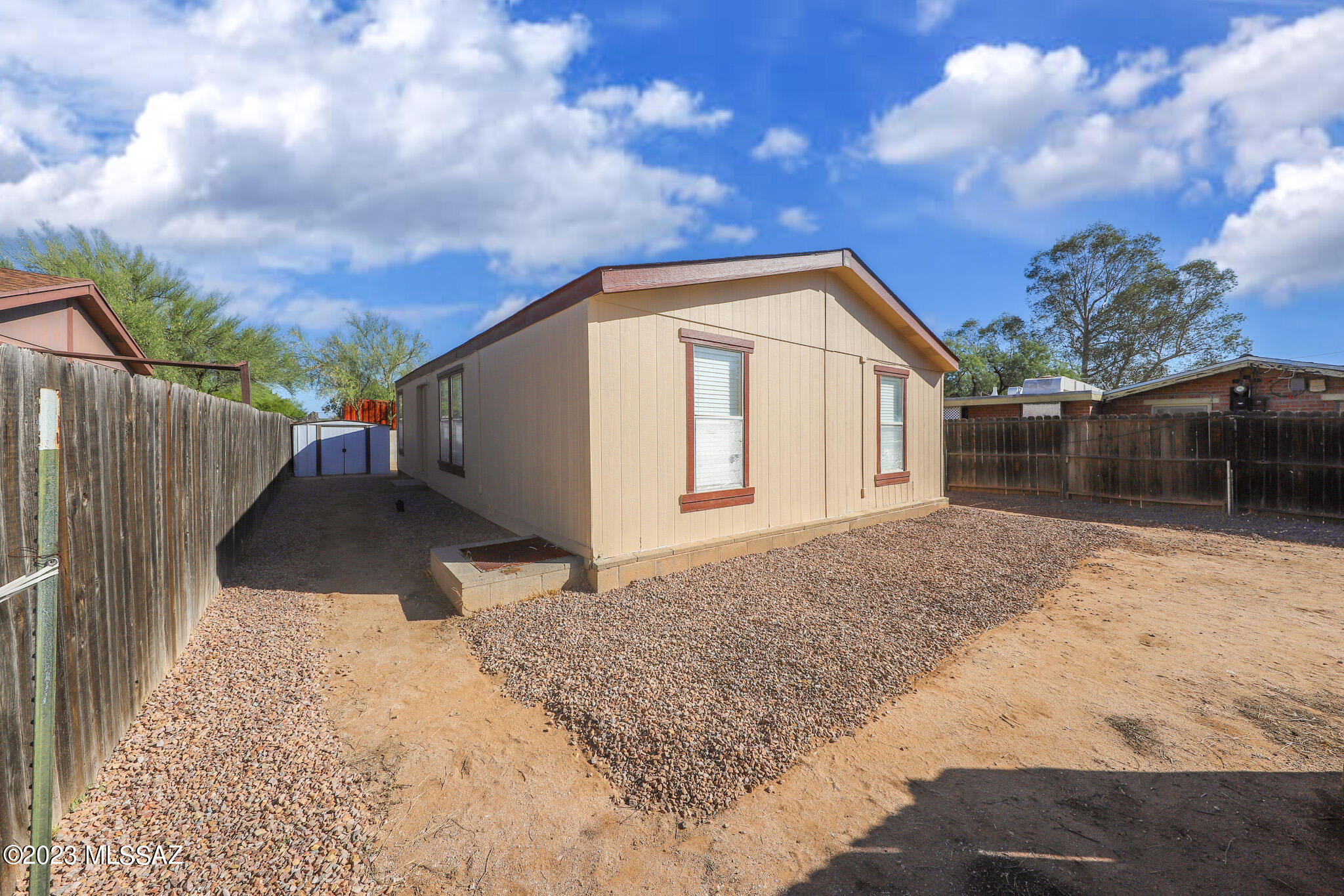 55 East King Road Tucson, AZ 85705 - Photo 2 of 26 a front view of a house with a yard