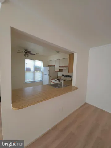 a view of a living room and bathroom