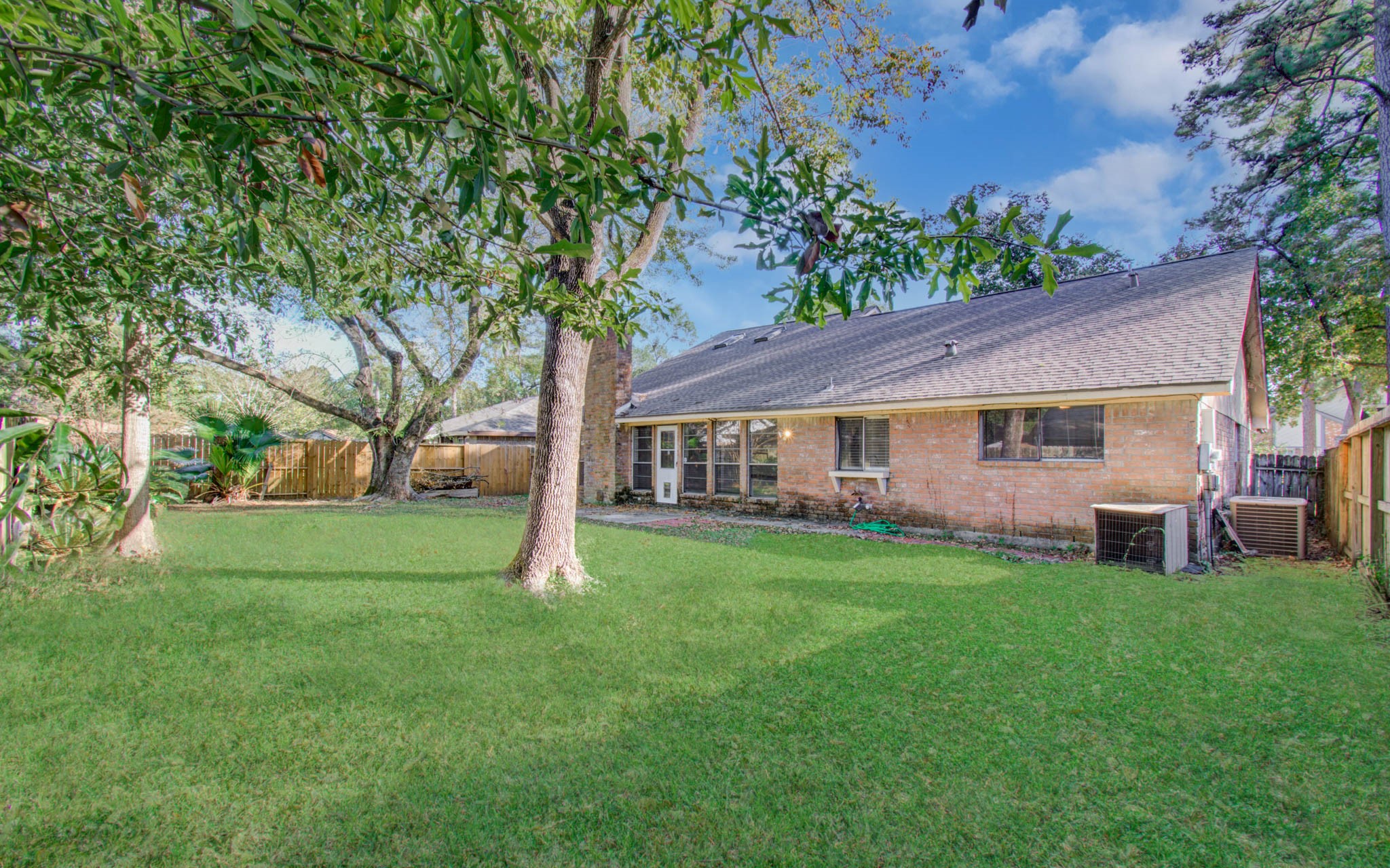 5311 Sweetwind Lane Spring, TX 77373 - Photo 18 of 18 a front view of a house with garden