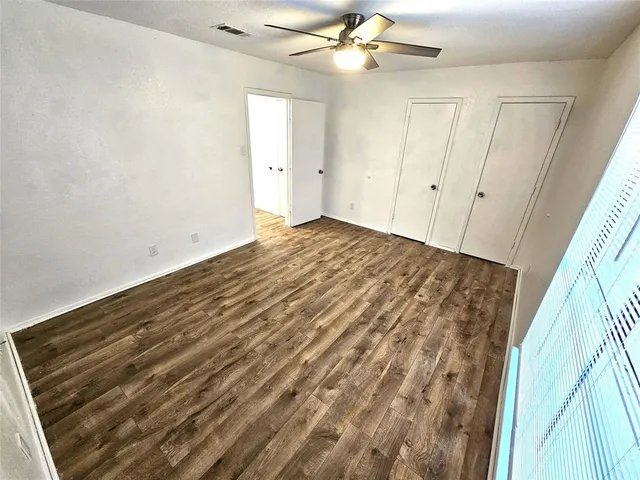 a view of a room with a window