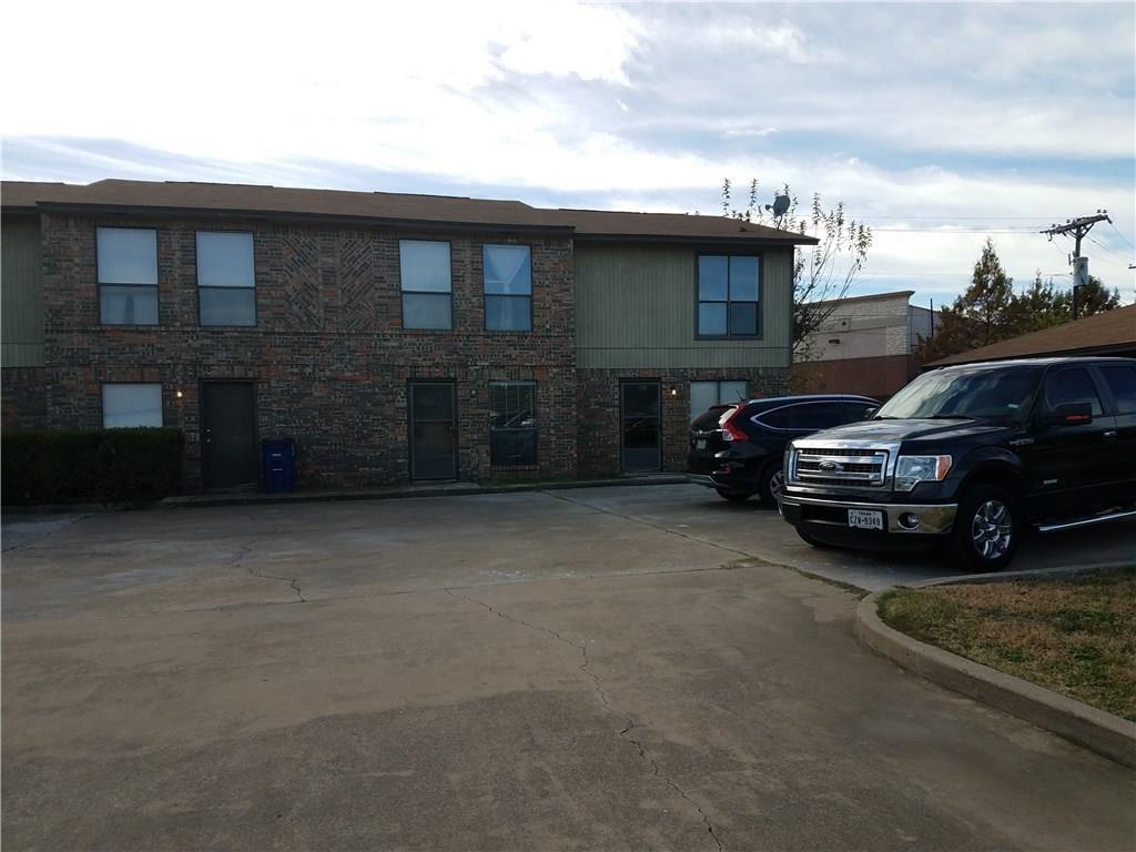 724 Bluebonnet Drive, Unit A Keller, TX 76248 - Photo 26 of 27 a view of a car parked in front of a building