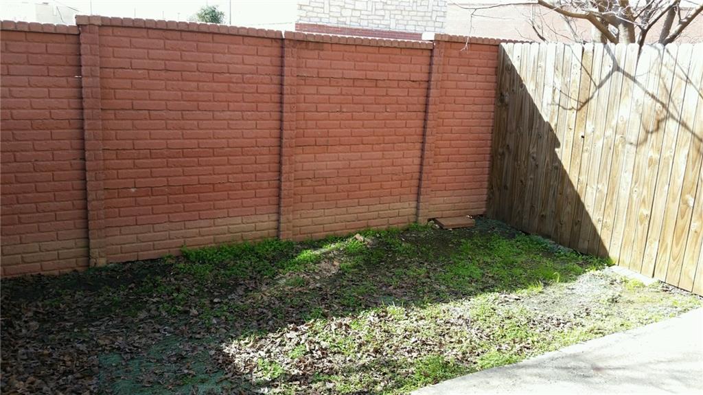 724 Bluebonnet Drive, Unit A Keller, TX 76248 - Photo 27 of 27 a view of a pathway with a backyard