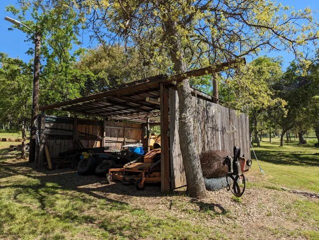 a building with trees in the background