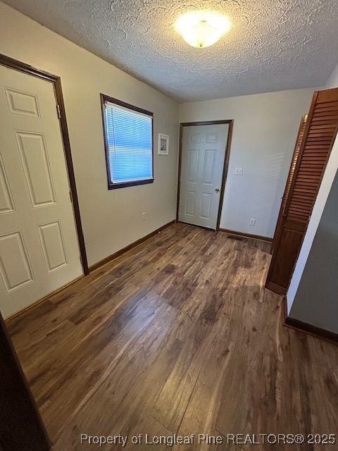10708 Highway 301 Lumberton, NC 28360 - Photo 11 of 14 a view of a hallway with wooden floor
