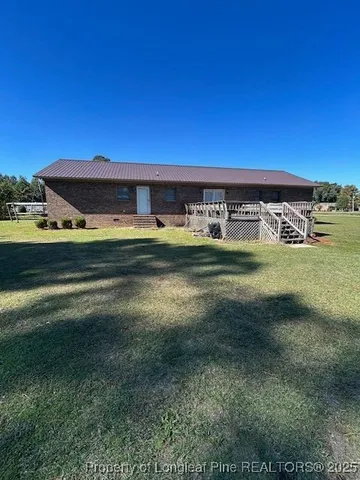 a view of a yard with an outdoor space