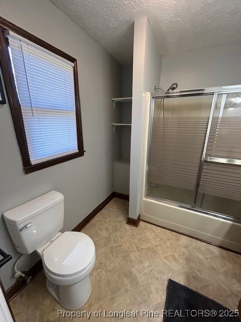 10708 Highway 301 Lumberton, NC 28360 - Photo 5 of 14 a bathroom with a toilet and a shower