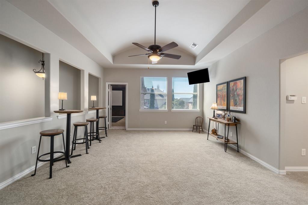 11571 Cody Lane Frisco, TX 75033 - Photo 22 of 39 a view of a livingroom with furniture and windows