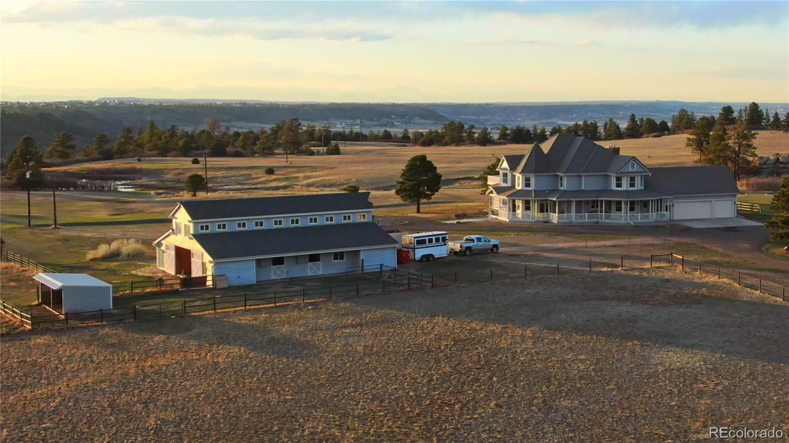 727 East Rim Road Franktown, CO 80116 - Photo 4 of 40 a view of a city