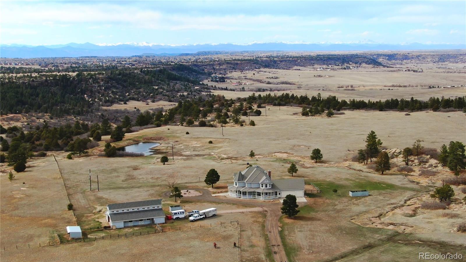 727 East Rim Road Franktown, CO 80116 - Photo 6 of 40 a view of a ocean with beach