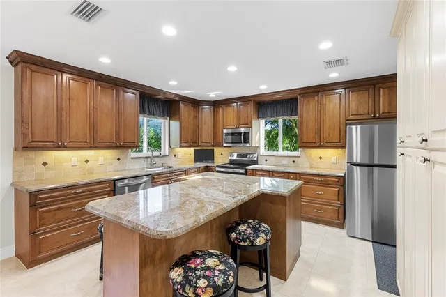 $479,900 | 7237 East Tropical Way, Plantation, FL 33317