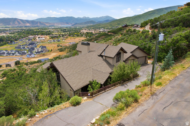 335 Bern Way Midway, UT 84049 - Photo 87 of 88 Contemporary multi-level residence with a multi-car garage, featuring a complex roofline and integrated chimney
